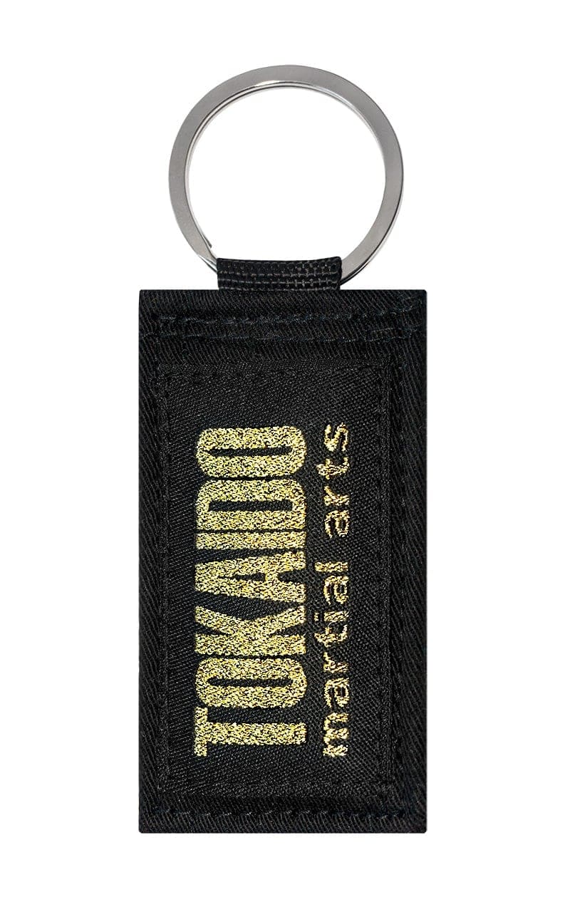 Karate Schlüsselanhänger, TOKAIDO martial arts Obi, schwarz-gold