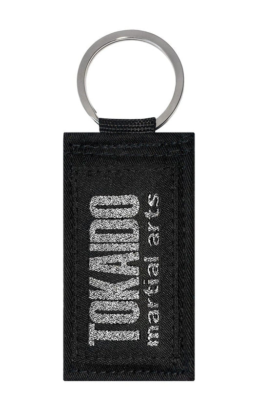 Karate Schlüsselanhänger, TOKAIDO martial arts Obi, schwarz-silber